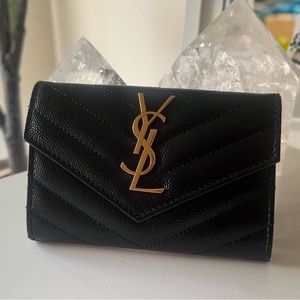 YSL Cassandra Small envelope wallet in Grain de Poudre Embossed Leather